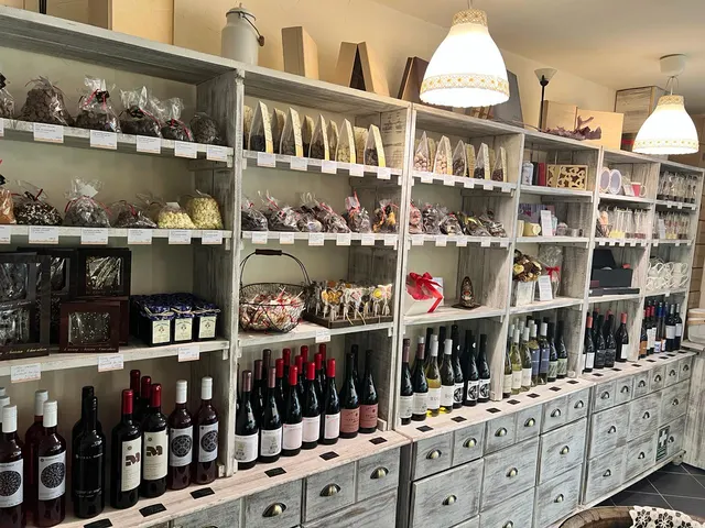 Shelves with chocolates and wines