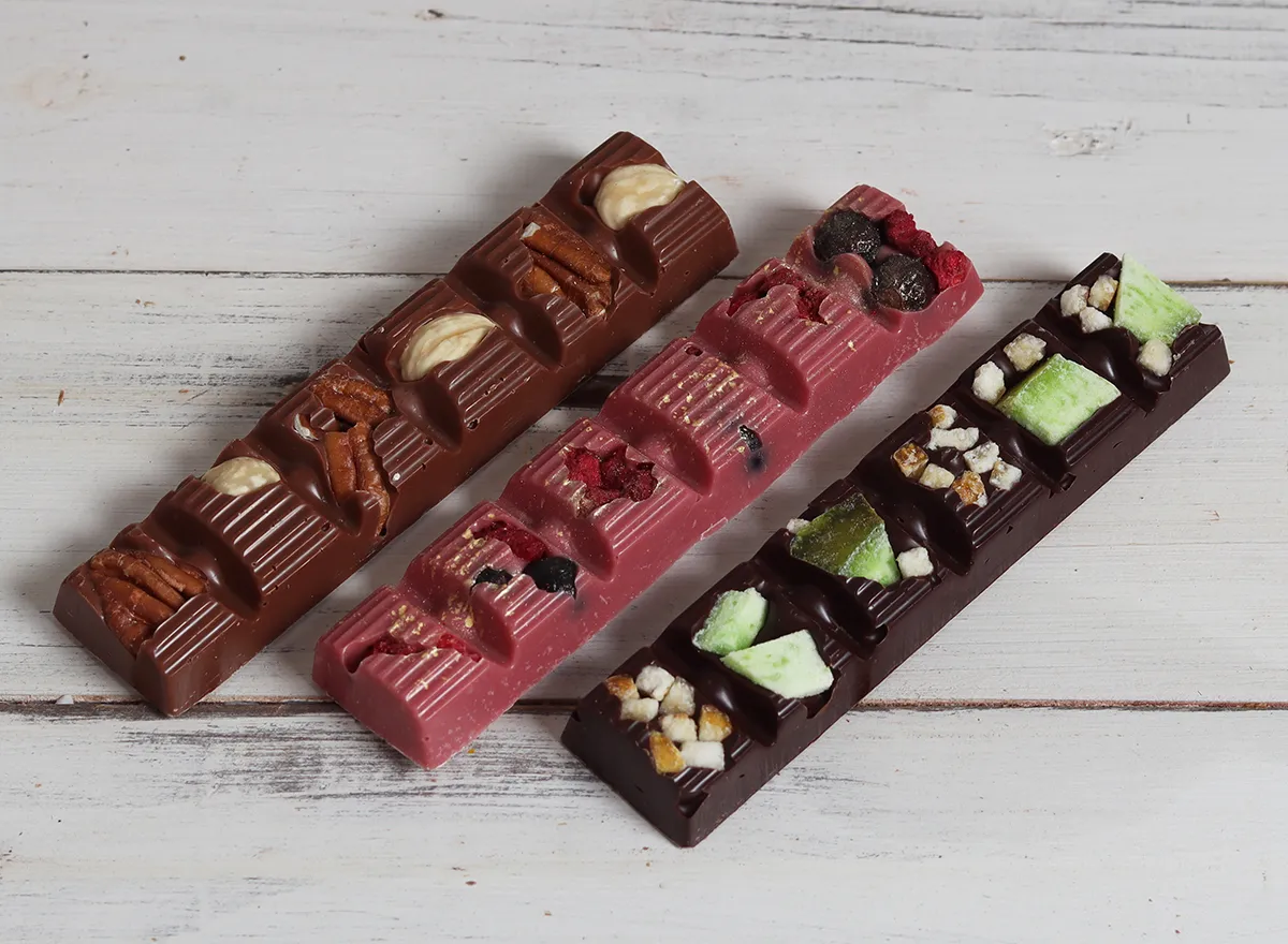 Handmade chocolate bars with nuts and fruit